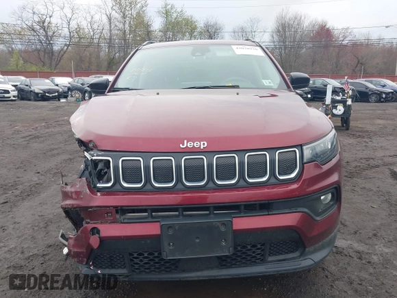 2022 Jeep Compass Latitude with VIN 3C4NJDBB7NT206323, listed as a IAAI auction lot 42038930 with 84,976 mi miles and . Bid and sale history available at DreamBid. Image 12.