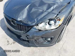 2015 Mazda CX-5 Touring with VIN JM3KE2CY9F0468199, listed as a IAAI auction lot 42099253 with 110,909 mi miles and . Bid and sale history available at carsss.com. Image 6.