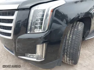 2018 Cadillac Escalade Luxury with VIN 1GYS4BKJ3JR143952, listed as a IAAI auction lot 41333902 with 124,265 mi miles. Bid and sale history available at carsss.com. Image 18.