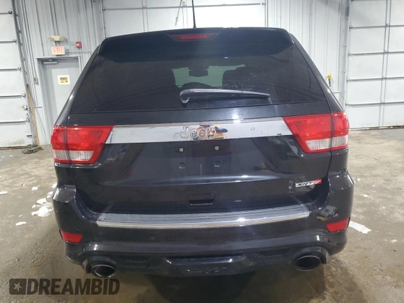 2012 Jeep Grand Cherokee SRT8 with VIN 1C4RJFDJ7CC187475, listed as a Copart auction lot 45191285 with 133,748 mi miles and Salvage Title. Bid and sale history available at carsss.com. Image 6.