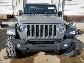 2023 Jeep Wrangler Sport S with VIN 1C4HJXDG8PW675134, listed as a Copart auction lot 85949314 with 19,128 mi miles and Salvage Title. Bid and sale history available at DreamBid. Image 5.