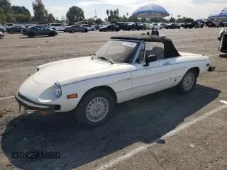 1979 Alfa Romeo Spider z VIN AR115410008442, wystawiony jako Copart lot #74153404 z przebiegiem 119 007 mil mil oraz Tytuł czysty. Historia ofert i sprzedaży dostępna na DreamBid. Obrazek 1.