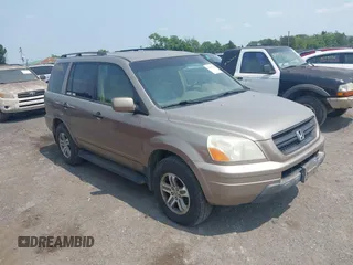 2003 Honda Pilot EX z VIN 2HKYF18573H616924, wystawiony jako IAAI lot #42426751 z przebiegiem 273 073 mil mil oraz . Historia ofert i sprzedaży dostępna na DreamBid. Obrazek 1.