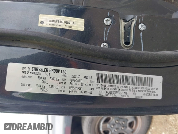 2014 Jeep Patriot Sport with VIN 1C4NJPBB6ED906017, listed as a IAAI auction lot 42097186 with 203,896 mi miles. Bid and sale history available at carsss.com. Image 9.