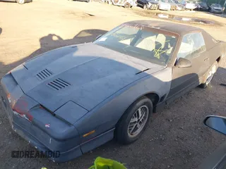 1988 Pontiac Firebird with VIN 1G2FW21F2JL251274, listed as a IAAI auction lot 41766168 with 999,999 mi miles. Bid and sale history available at carsss.com. Image 2.