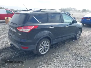 2014 Ford Escape SE with VIN 1FMCU0G9XEUE35271, listed as a IAAI auction lot 40896477 with 139,444 mi miles. Bid and sale history available at carsss.com. Image 4.