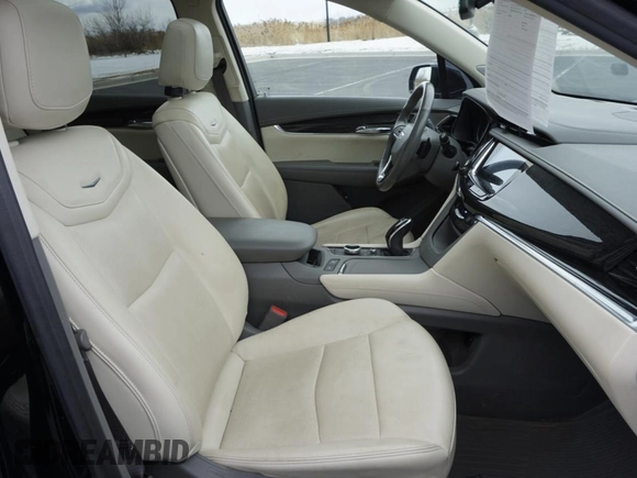 2021 Cadillac XT6 Premium Luxury z VIN 1GYKPDRS3MZ113033, wystawiony jako Copart lot #50076845 z przebiegiem 104 248 mil mil oraz Szkody całkowita. Historia ofert i sprzedaży dostępna na DreamBid. Obrazek 5.