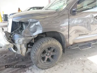 2012 Toyota Tundra with VIN 5TFUY5F13CX259312, listed as a IAAI auction lot 42547918 with 182,190 mi miles and . Bid and sale history available at DreamBid. Image 6.