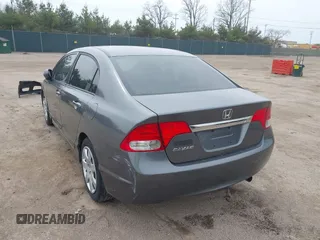 2011 Honda Civic LX with VIN 19XFA1F54BE032699, listed as a IAAI auction lot 42060272 with 197,905 mi miles and . Bid and sale history available at DreamBid. Image 3.