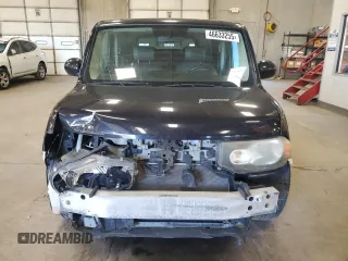 2010 Nissan Cube S z VIN JN8AZ2KR7AT162486, wystawiony jako Copart lot #46633255 z przebiegiem 168 415 mil mil oraz Nie do naprawy • Non repairable. Historia ofert i sprzedaży dostępna na DreamBid. Obrazek 5.