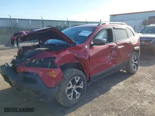 2016 Jeep Cherokee Trailhawk with VIN 1C4PJMBS7GW339833, listed as a IAAI auction lot 41943272 with 118,789 mi miles. Bid and sale history available at carsss.com. Image 17.