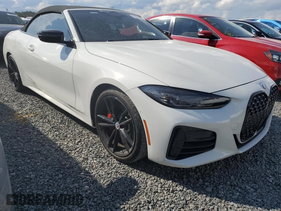 2023 BMW 4 Series M440i with VIN WBA53AT01PCL61211, listed as a Copart auction lot 74137914 with 12,476 mi miles and Salvage Title. Bid and sale history available at DreamBid. Image 4.