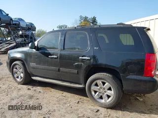 2011 GMC Yukon SLT with VIN 1GKS2CE02BR109155, listed as a IAAI auction lot 41925194 with 238,479 mi miles. Bid and sale history available at carsss.com. Image 13.
