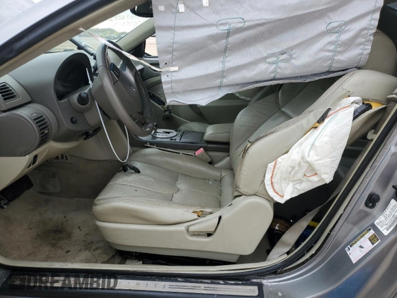 2004 Infiniti G35 Coupe w/Leather with VIN JNKCV54E34M801844, listed as a Copart auction lot 87820895 with 136,257 mi miles and Salvage Title. Bid and sale history available at carsss.com. Image 7.