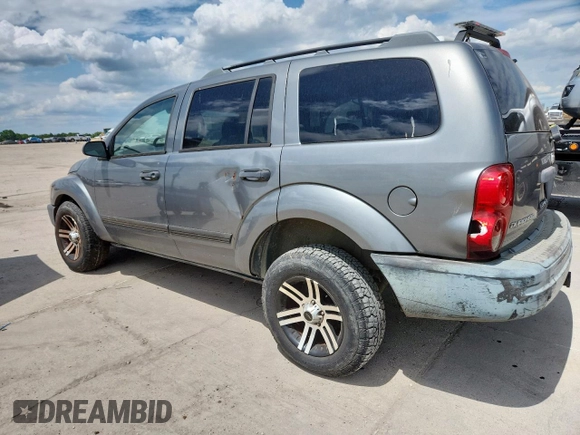 2005 Dodge Durango SXT с VIN 1D4HD38NX5F601092, выставлен на аукционе Copart как лот 63338515 с пробегом 301 984 миль миль и Чистый • Clean title. История ставок и продаж доступна на DreamBid. Изображение 2.