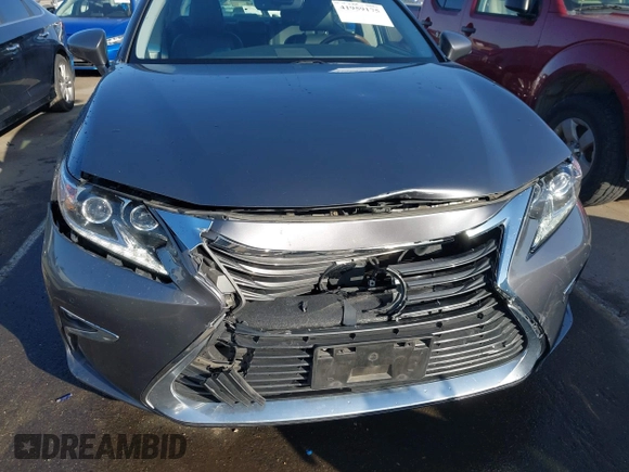 2016 Lexus ES 300h z VIN JTHBW1GG6G2108510, wystawiony jako IAAI lot #41959175 z przebiegiem 142 882 mil mil oraz . Historia ofert i sprzedaży dostępna na DreamBid. Obrazek 6.
