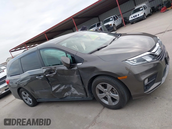 2018 Honda Odyssey EX-L with VIN 5FNRL6H75JB044789, listed as a IAAI auction lot 41625002 with 58,033 mi miles and . Bid and sale history available at DreamBid. Image 13.