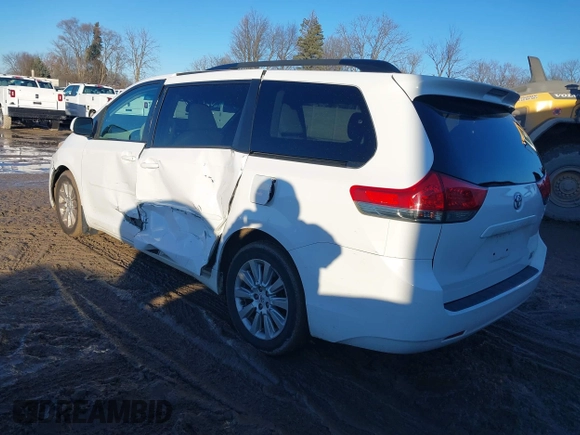 2012 Toyota Sienna XLE with VIN 5TDDK3DC4CS042464, listed as a IAAI auction lot 41199300 with 143,677 mi miles. Bid and sale history available at carsss.com. Image 3.