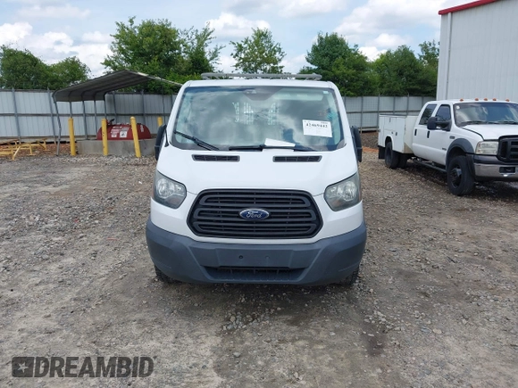 2016 Ford Transit Cargo z VIN 1FTYR2ZM9GKB01756, wystawiony jako IAAI lot #42469442 z przebiegiem 180 944 mil mil oraz . Historia ofert i sprzedaży dostępna na DreamBid. Obrazek 12.