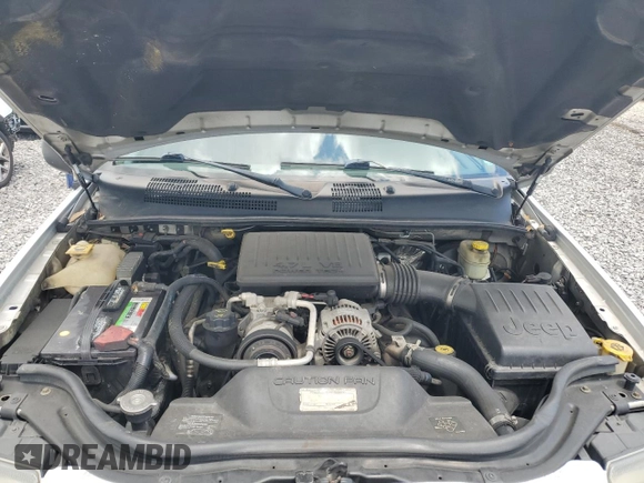 2004 Jeep Grand Cherokee Laredo z VIN 1J4GX48N94C386031, wystawiony jako Copart lot #55804755 z przebiegiem 160 103 mil mil oraz Szkoda całkowita • Salvage title. Historia ofert i sprzedaży dostępna na DreamBid. Obrazek 12.