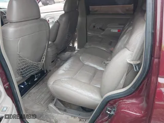 1999 Chevrolet Tahoe with VIN 1GNEC13R8XJ511786, listed as a IAAI auction lot 41538890 with 196,764 mi miles. Bid and sale history available at carsss.com. Image 8.