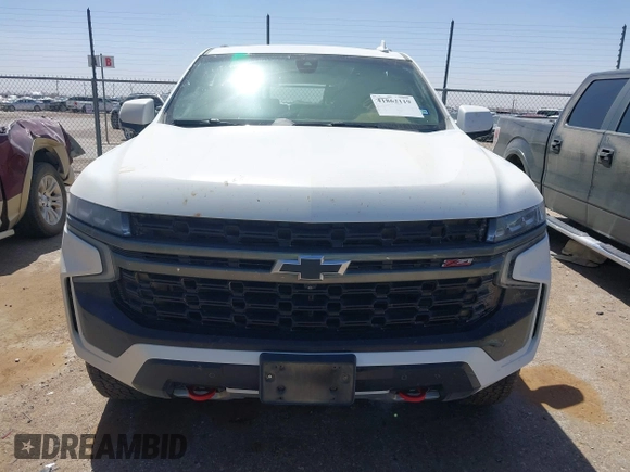 2021 Chevrolet Tahoe Z71 with VIN 1GNSKPKD6MR292371, listed as a IAAI auction lot 41862119 with 81,119 mi miles and . Bid and sale history available at DreamBid. Image 12.