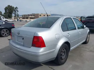 2003 Volkswagen Jetta GL with VIN 3VWRK69M43M045127, listed as a IAAI auction lot 41697962 with 119,065 mi miles and . Bid and sale history available at DreamBid. Image 4.