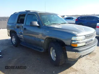 2002 Chevrolet Tahoe LT with VIN 1GNEC13Z12J233208, listed as a IAAI auction lot 41659873 with 238,922 mi miles. Bid and sale history available at carsss.com. Image 1.