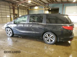 2021 Honda Odyssey Touring with VIN 5FNRL6H84MB009125, listed as a Copart auction lot 58248385 with 55,360 mi miles and Salvage title. Bid and sale history available at DreamBid. Image 2.