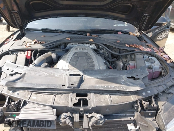 2017 Audi A8 with VIN WAU44AFDXHN004395, listed as a IAAI auction lot 41705688 with 63,282 mi miles and . Bid and sale history available at DreamBid. Image 10.