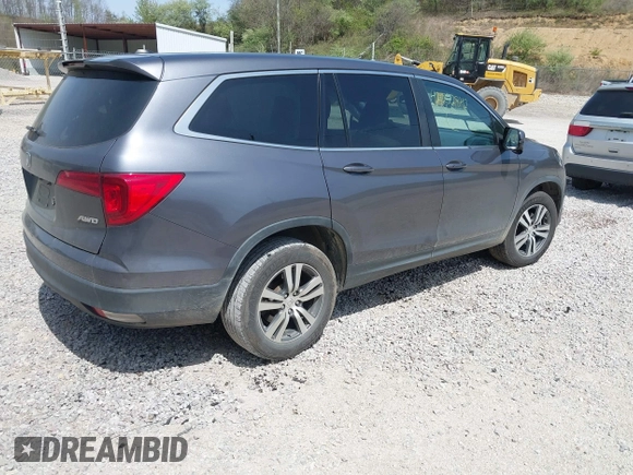 2018 Honda Pilot EX-L with VIN 5FNYF6H52JB066721, listed as a IAAI auction lot 42052842 with 134,393 mi miles and . Bid and sale history available at DreamBid. Image 4.