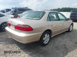 2000 Honda Accord EX z VIN 1HGCG1653YA030361, wystawiony jako IAAI lot #42268744 z przebiegiem 53 809 mil mil oraz . Historia ofert i sprzedaży dostępna na DreamBid. Obrazek 4.