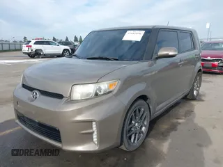 2014 Scion xB with VIN JTLZE4FE7EJ065646, listed as a IAAI auction lot 41681896 with 149,534 mi miles. Bid and sale history available at carsss.com. Image 19.
