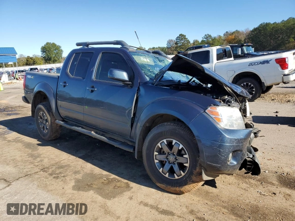 2016 Nissan Frontier Pro-4X z VIN 1N6AD0EV6GN799371, wystawiony jako Copart lot #81292914 z przebiegiem Nie podano mil oraz Szkoda całkowita • Salvage title. Historia ofert i sprzedaży dostępna na DreamBid. Obrazek 4.