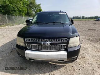 2011 Chevrolet Suburban LT z VIN 1GNSKJE31BR148448, wystawiony jako Copart lot #61057955 z przebiegiem 237 656 mil mil oraz Czysty tytuł • Clean title. Historia ofert i sprzedaży dostępna na DreamBid. Obrazek 5.