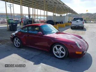 1997 Porsche 911 with VIN WP0AA2998VS322699, listed as a IAAI auction lot 41892833 with 117,174 mi miles and . Bid and sale history available at DreamBid. Image 1.