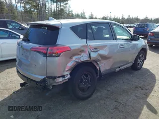 2018 Toyota RAV4 LE with VIN JTMBFREV8JJ224872, listed as a IAAI auction lot 41907962 with 104,605 mi miles and . Bid and sale history available at DreamBid. Image 4.