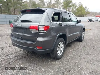 2021 Jeep Grand Cherokee Laredo X with VIN 1C4RJFAG6MC703691, listed as a IAAI auction lot 41655340 with 53,300 mi miles and . Bid and sale history available at DreamBid. Image 4.