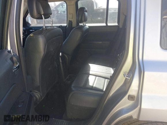 2014 Jeep Patriot High Altitude with VIN 1C4NJPFA4ED819007, listed as a IAAI auction lot 41381473 with 154,963 mi miles and . Bid and sale history available at carsss.com. Image 8.