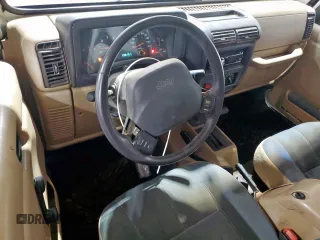 2001 Jeep Wrangler Sahara with VIN 1J4FA59S41P303519, listed as a Copart auction lot 59899545 with 238,151 mi miles and Clean title. Bid and sale history available at DreamBid. Image 8.