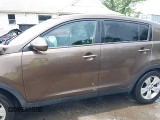 2012 Kia Sportage LX z VIN KNDPB3A20C7290990, wystawiony jako IAAI lot #42264420 z przebiegiem 87 994 mil mil oraz . Historia ofert i sprzedaży dostępna na DreamBid. Obrazek 14.