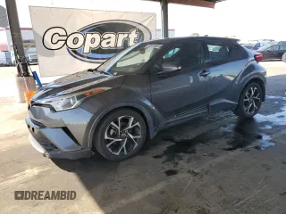 2018 Toyota C-HR XLE z VIN NMTKHMBX8JR017869, wystawiony jako Copart lot #59310865 z przebiegiem 122 720 mil mil oraz Czysty tytuł • Clean title. Historia ofert i sprzedaży dostępna na DreamBid. Obrazek 1.