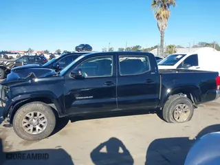 2017 Toyota Tacoma SR with VIN 5TFAX5GN5HX095074, listed as a IAAI auction lot 41814654 with 120,782 mi miles. Bid and sale history available at carsss.com. Image 15.