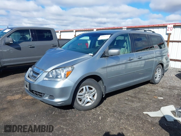 2007 Honda Odyssey EX with VIN 5FNRL384X7B119757, listed as a IAAI auction lot 41809763 with 163,526 mi miles and . Bid and sale history available at DreamBid. Image 17.