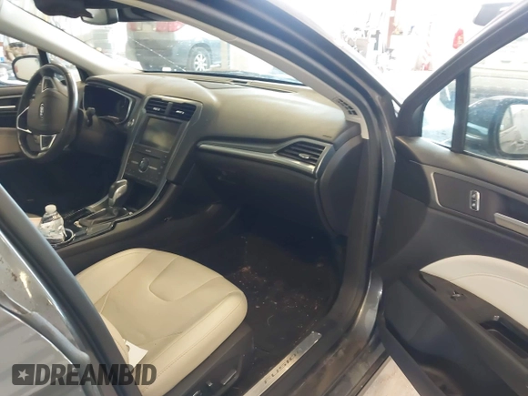 2016 Ford Fusion Titanium with VIN 3FA6P0D9XGR223354, listed as a IAAI auction lot 42621924 with Not provided miles and . Bid and sale history available at DreamBid. Image 5.
