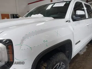 2017 GMC Sierra 1500 SLE z VIN 3GTU2MEC4HG374723, wystawiony jako IAAI lot #41400381 z przebiegiem 141 896 mil mil oraz . Historia ofert i sprzedaży dostępna na DreamBid. Obrazek 18.