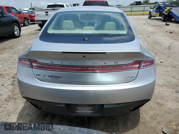 2014 Lincoln MKZ с VIN 3LN6L2G9XER816671, выставлен на аукционе Copart как лот 59883485 с пробегом 170 845 миль миль и Списание • Salvage title. История ставок и продаж доступна на DreamBid. Изображение 6.