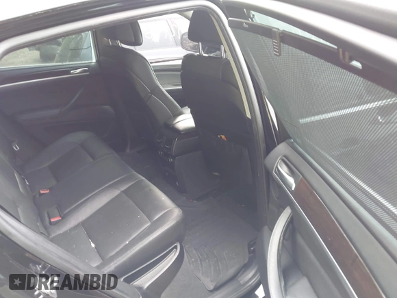 2013 BMW X6 xDrive50i z VIN 5UXFG8C56DL591241, wystawiony jako IAAI lot #42505847 z przebiegiem 142 973 mil mil oraz . Historia ofert i sprzedaży dostępna na DreamBid. Obrazek 8.