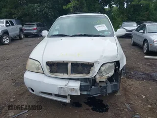 2004 Kia Sedona LX with VIN KNDUP131446493787, listed as a IAAI auction lot 40004348 with 168,374 mi miles. Bid and sale history available at carsss.com. Image 6.