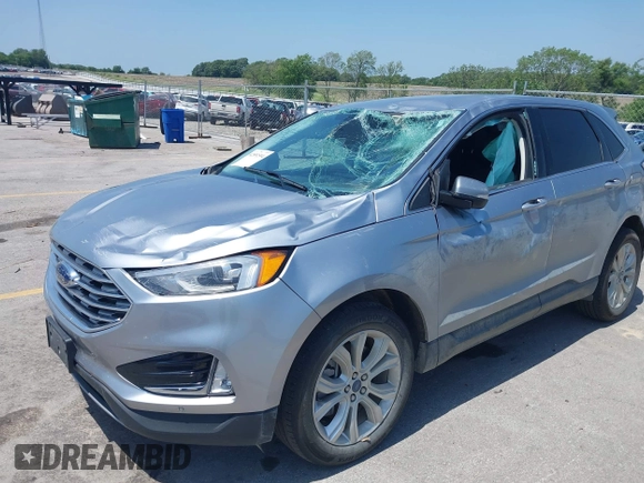 2022 Ford Edge Titanium with VIN 2FMPK4K96NBA41746, listed as a IAAI auction lot 42551594 with 86,730 mi miles and . Bid and sale history available at DreamBid. Image 2.